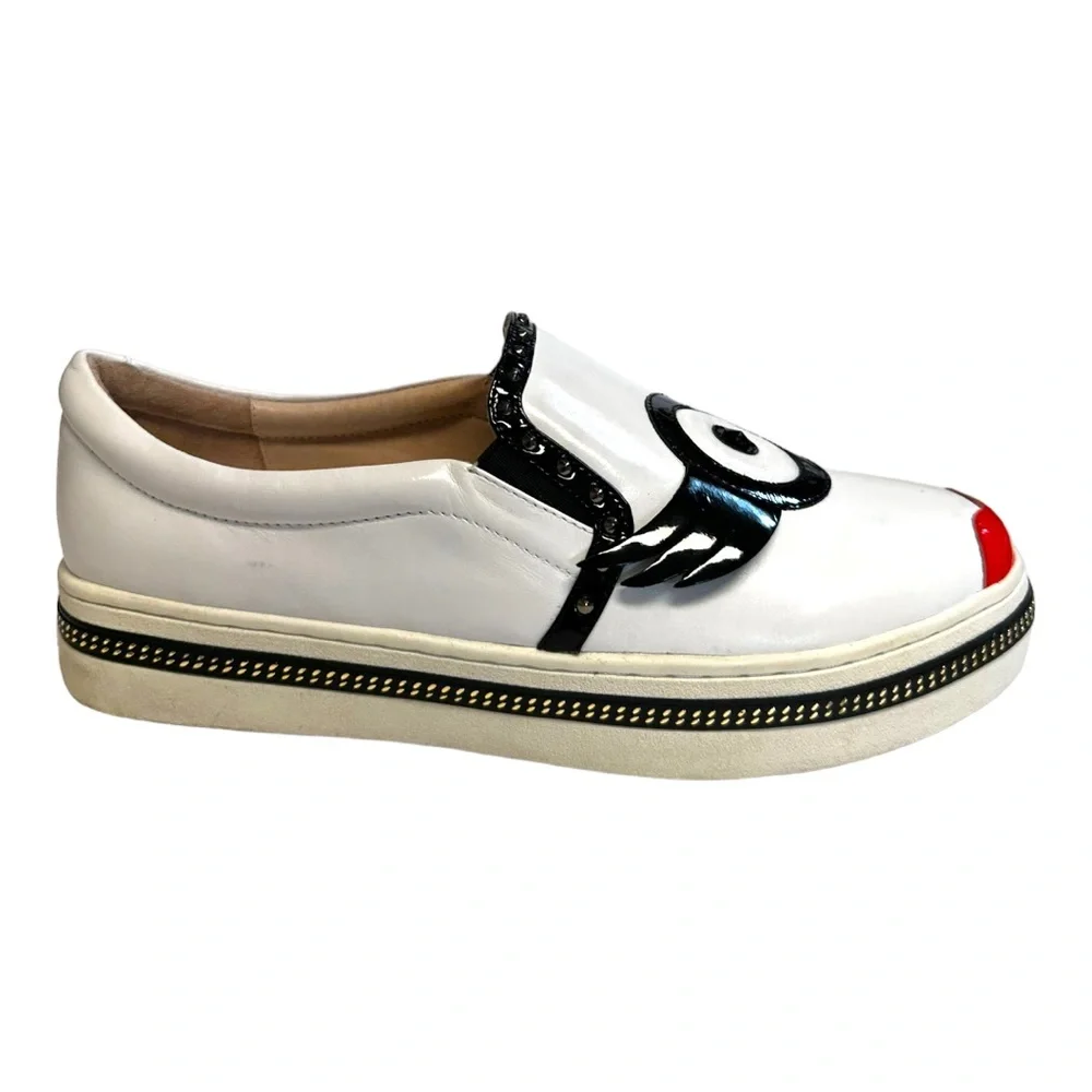 White Leather Slip-On Sneakers with Black Trim and Red Accent